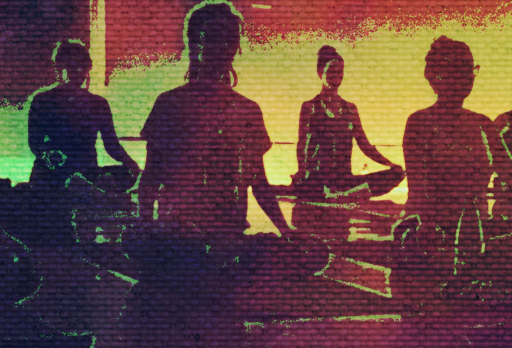 yoga studio group seated meditation